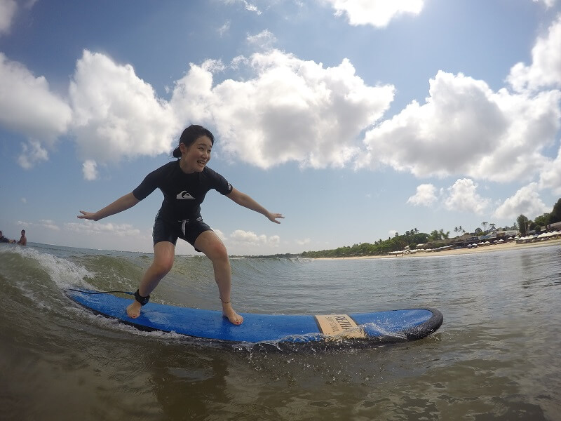 beginner surfing waves in canggu bali
