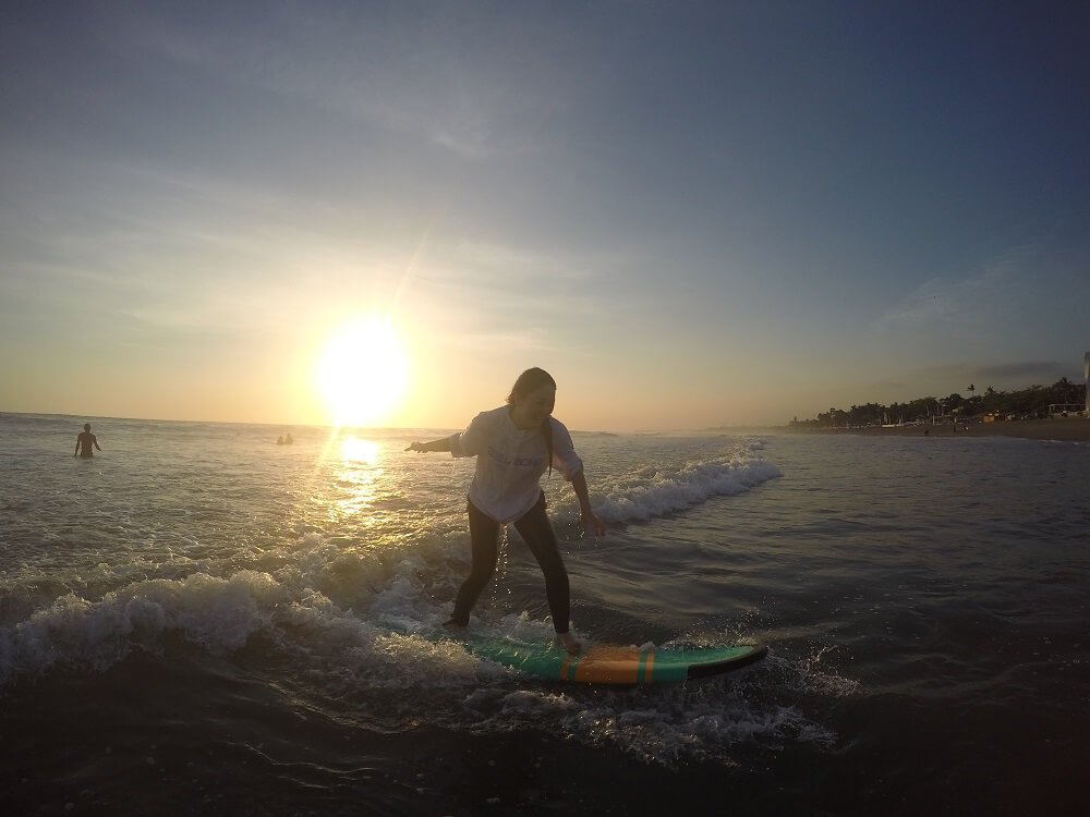 surf on sunset Best time to surf for begginer in Canggu Bali,