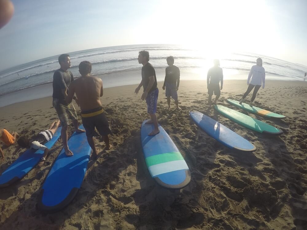 Best time to surf on sunset in canggu bali. Explanations gruop surf lessons for safety , how to stand-up on the board